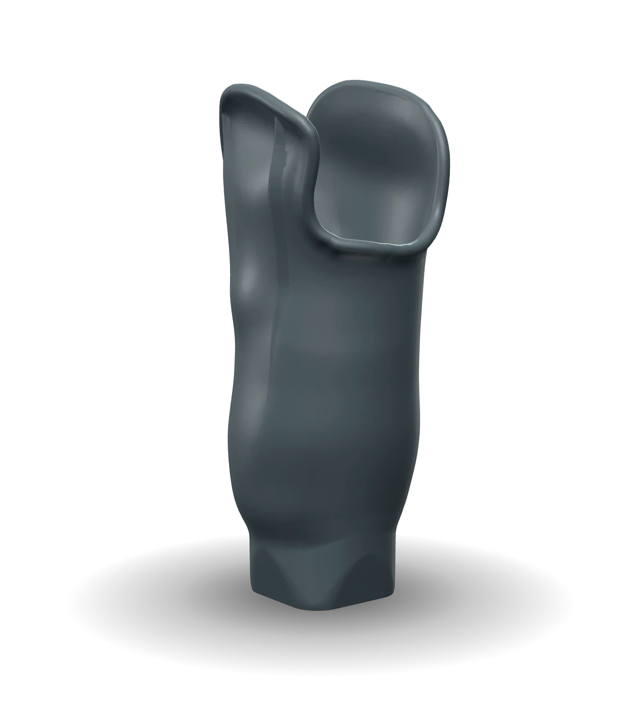 A printed transtibial socket in carbon-fibre polyamide, with a winged supracondylar trimline and a turned adapter block